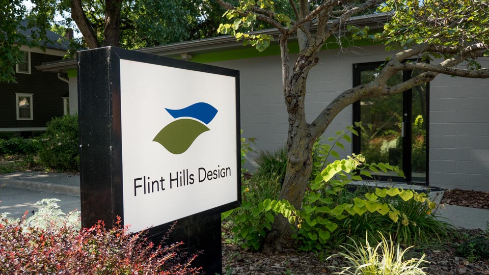 Flint Hills Design exterior sign in front of the office building.
